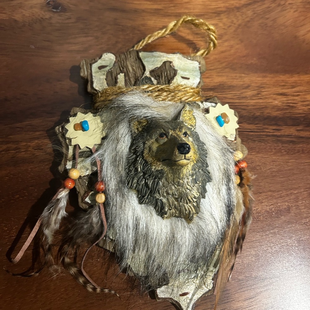 Rustic Wolf Wall Decor with Feathers